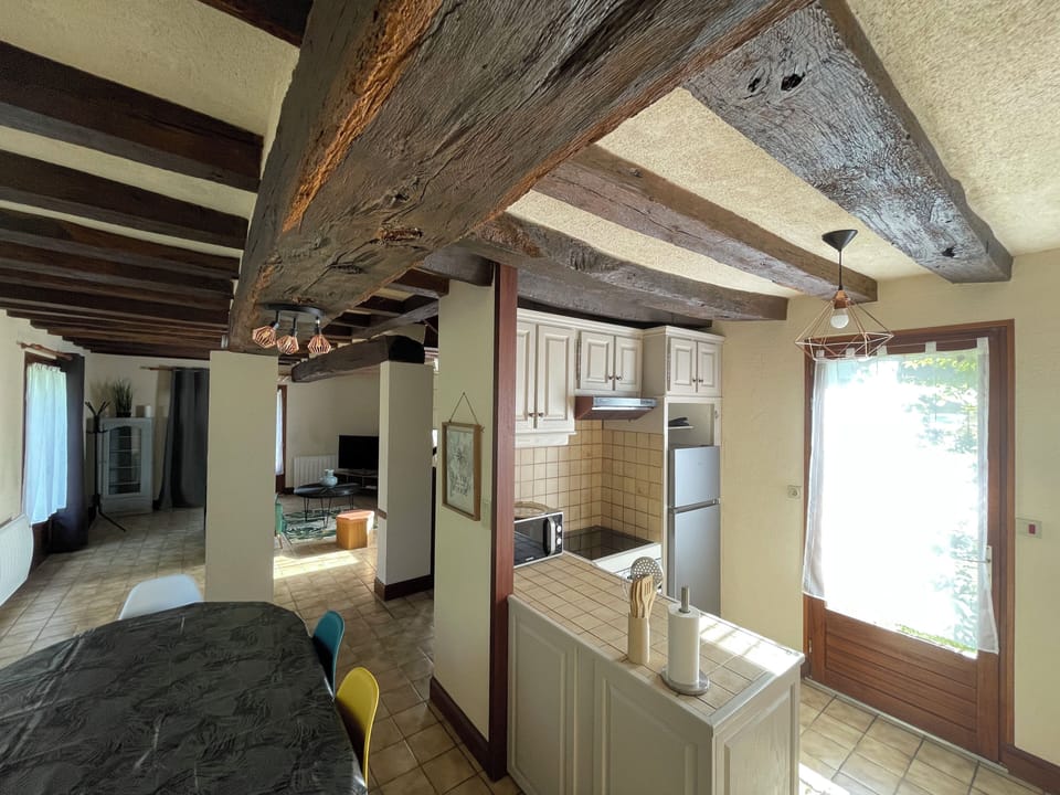 Lodge Domaine Jeanne de Laval | Living area | 32-inch TV with satellite channels, Netflix, Hulu