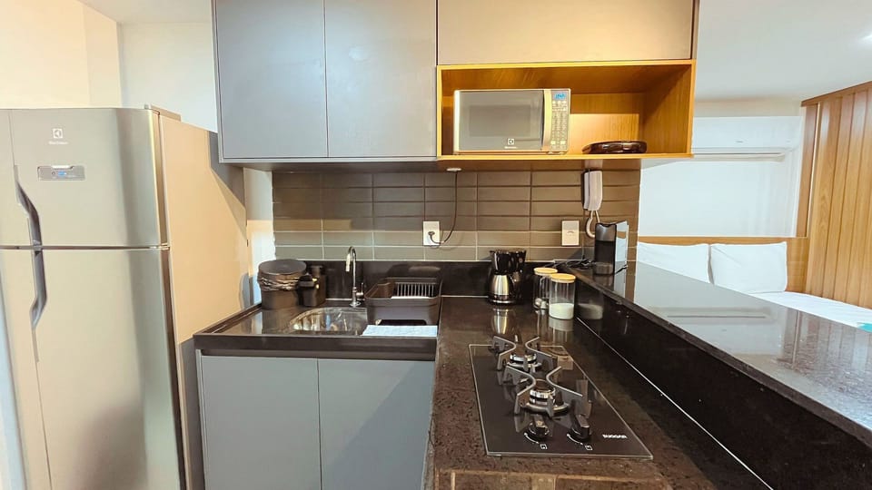 Superior Apartment | Private kitchen | Full-size fridge, microwave, stovetop, cookware/dishes/utensils
