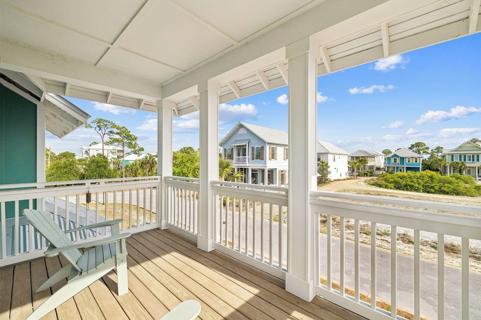 Step onto your private balcony and soak in peaceful neighborhood views while enjoying your morning coffee in this cozy coastal retreat.