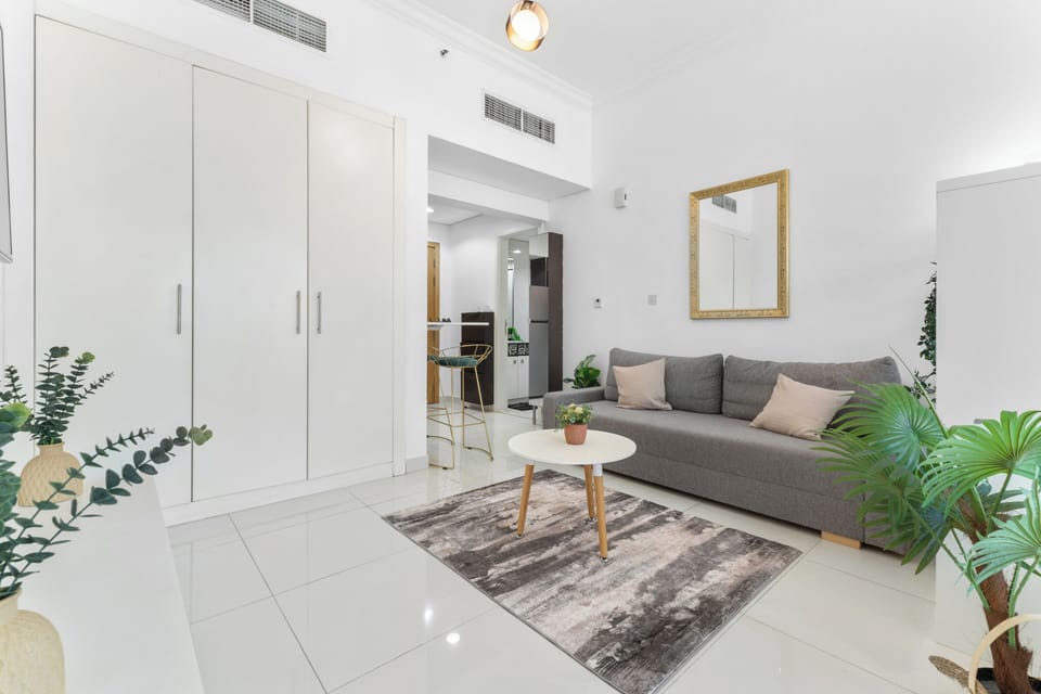 Deluxe Studio, Balcony, Canal View | Living area | Flat-screen TV
