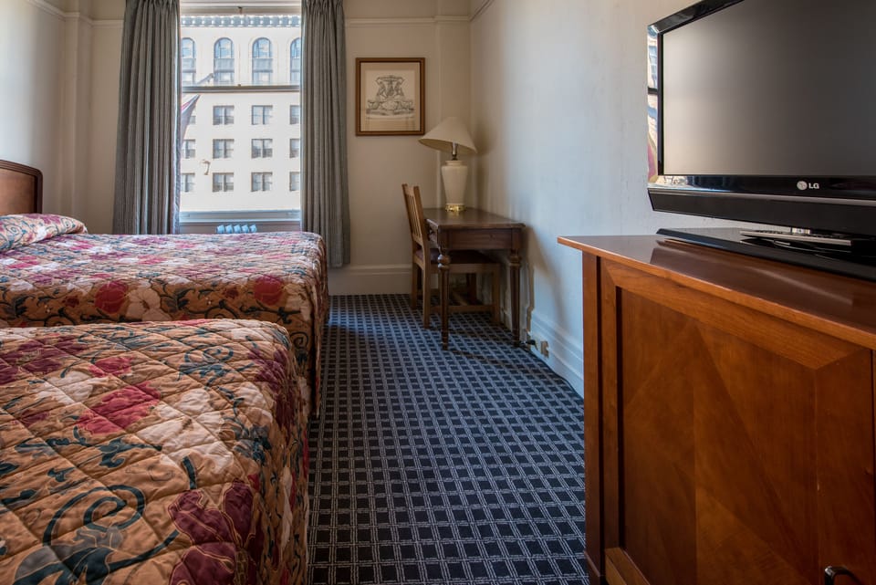 Standard Room, 2 Twin Beds | In-room safe, iron/ironing board, free WiFi, bed sheets