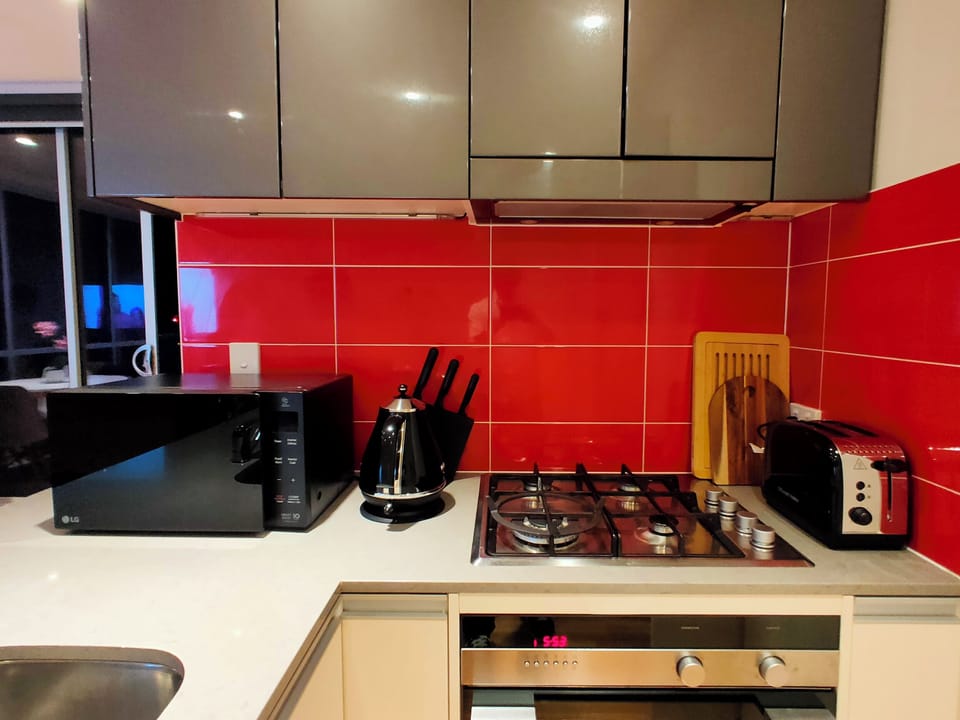 Luxury Apartment, Balcony, Ocean View | Private kitchen | Full-size fridge, microwave, oven, stovetop