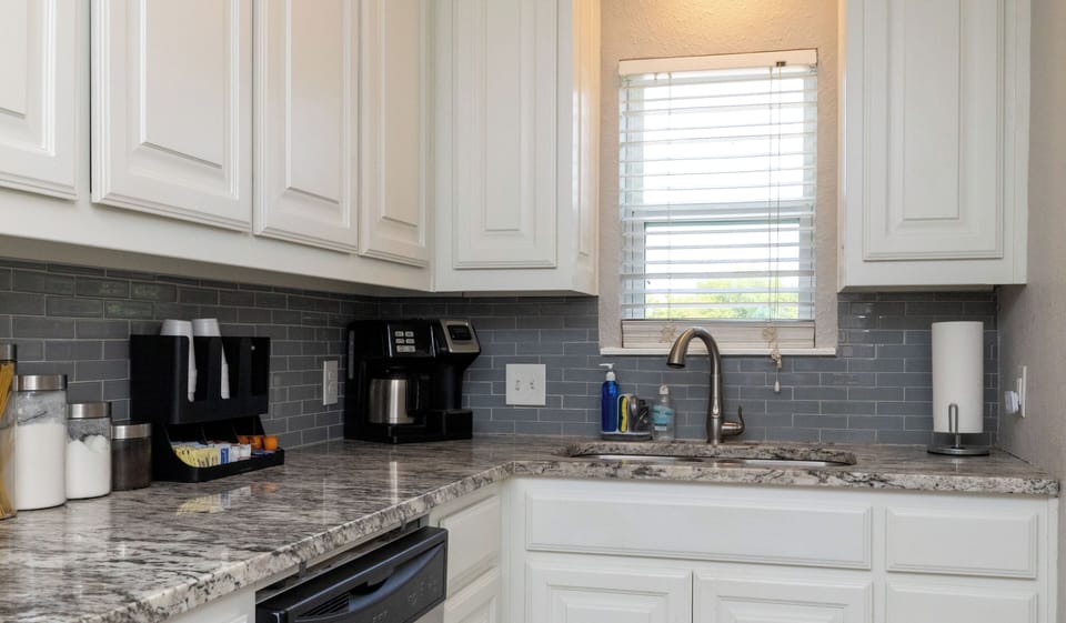 Fully stocked kitchen with coffee and tea available