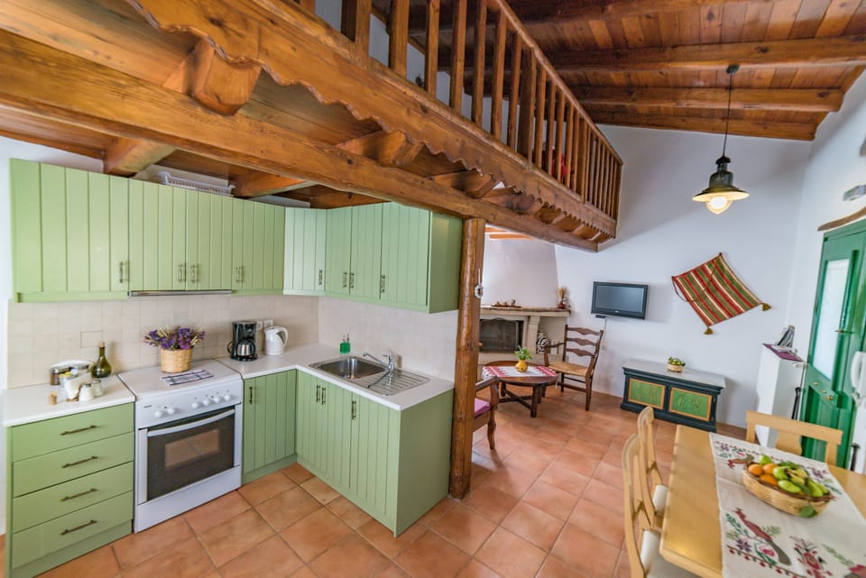 Family Apartment, 2 Bedrooms | Private kitchen | Fridge, stovetop, coffee/tea maker, electric kettle