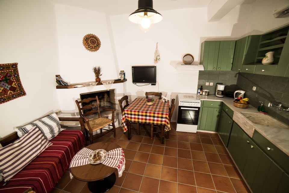 Family Apartment, 2 Bedrooms | Living area | TV, fireplace