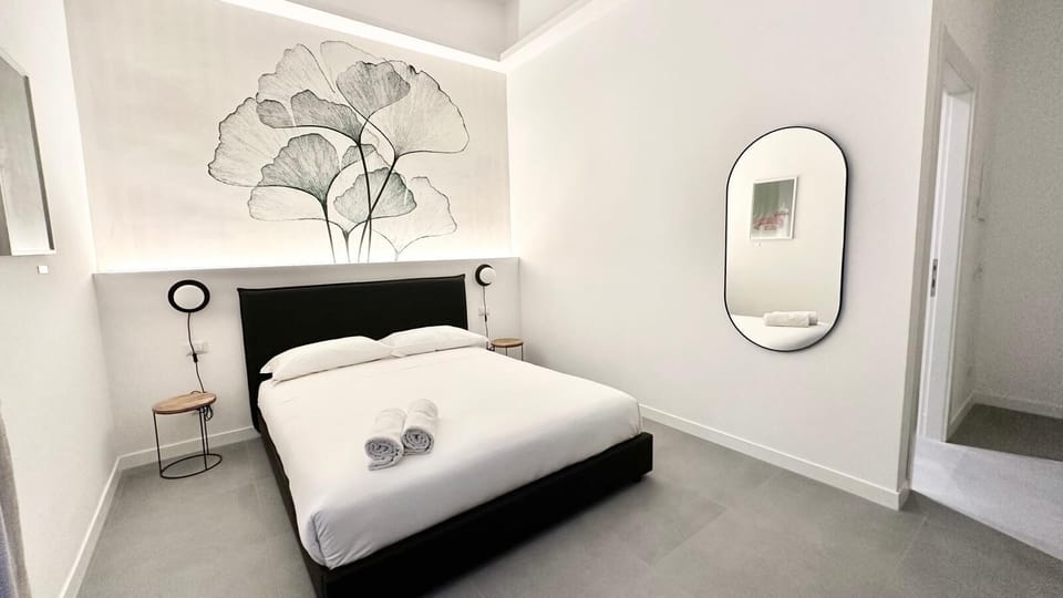 Deluxe Room | Down comforters, in-room safe, desk, iron/ironing board (on request)