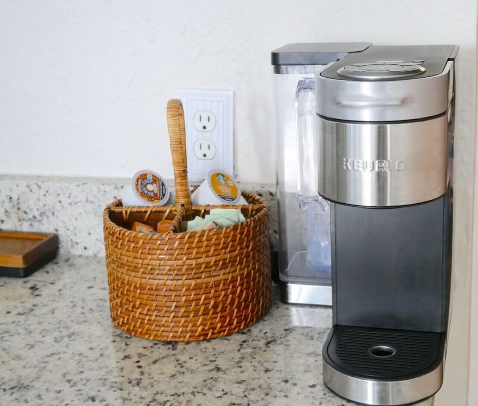 We have a Keurig coffee machine that can make hot or cold drinks. We supply coffee pods, creamer and sugar. We also have ice to make iced coffees!