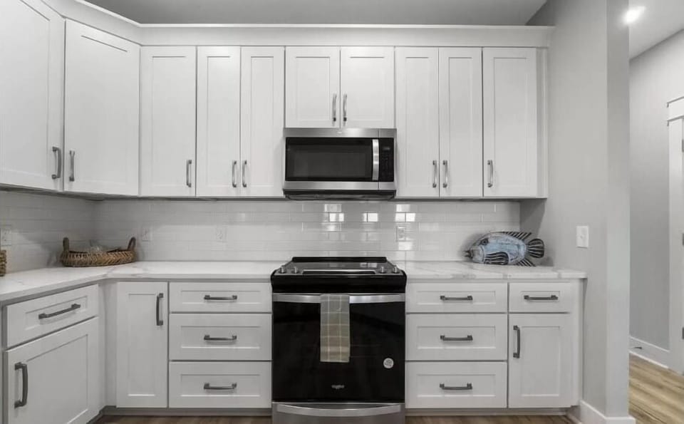 Stay in and cook for the whole family with our stainless steel oven and electric stove top. This is the heart of our home, where culinary creations and cherished memories are made!