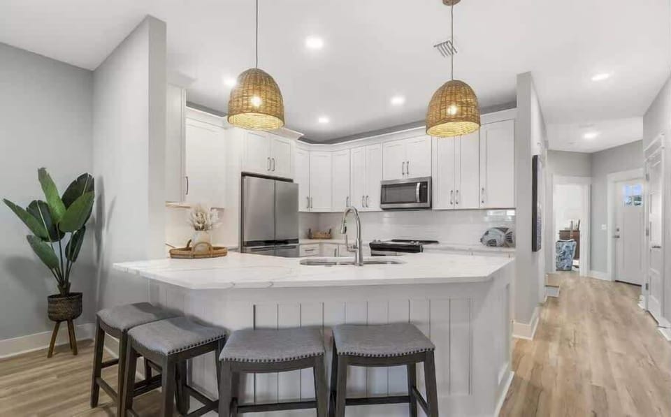 Step into our spacious kitchen, offering plenty of counter space; perfect for cooking and entertaining with loved ones!