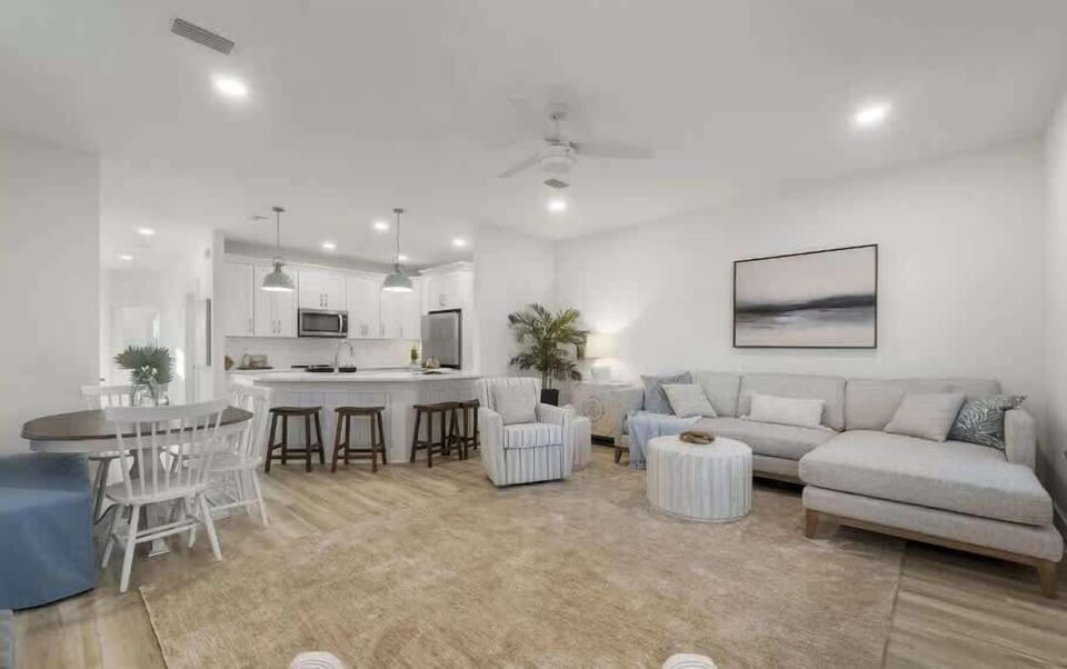 Relax and rejuvenate in the living room, with an open floor plan. enjoy spending time with loved ones from the kitchen to the spacious living room.