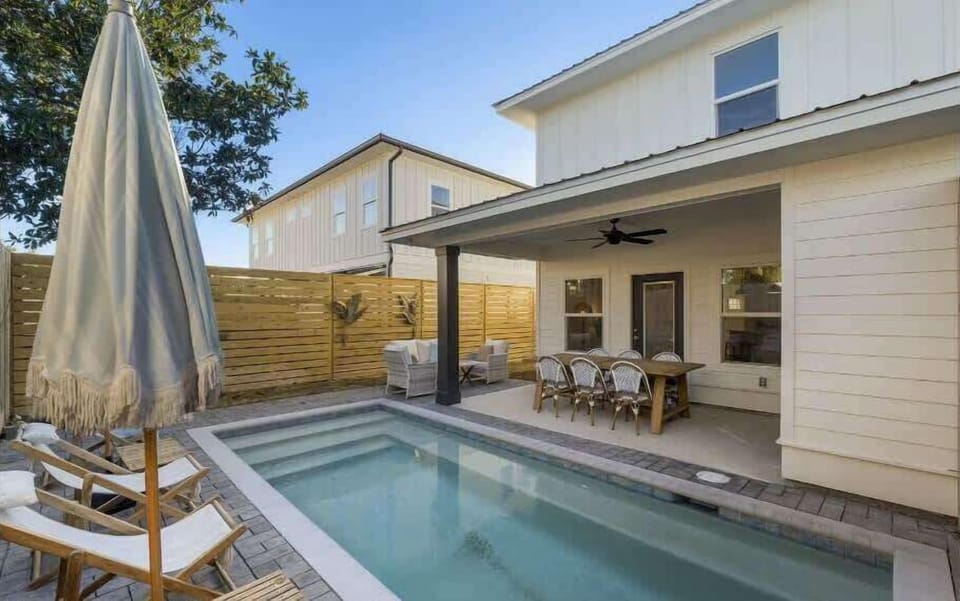 immerse yourself in relaxation at our inviting pool and patio area, where sunny skies and plush loungers set the stage for unwinding and savoring leisurely moments.