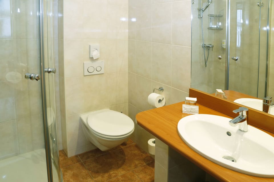 Apartment, 2 Bedrooms (No Kitchen) | Bathroom | Shower, free toiletries, hair dryer, towels