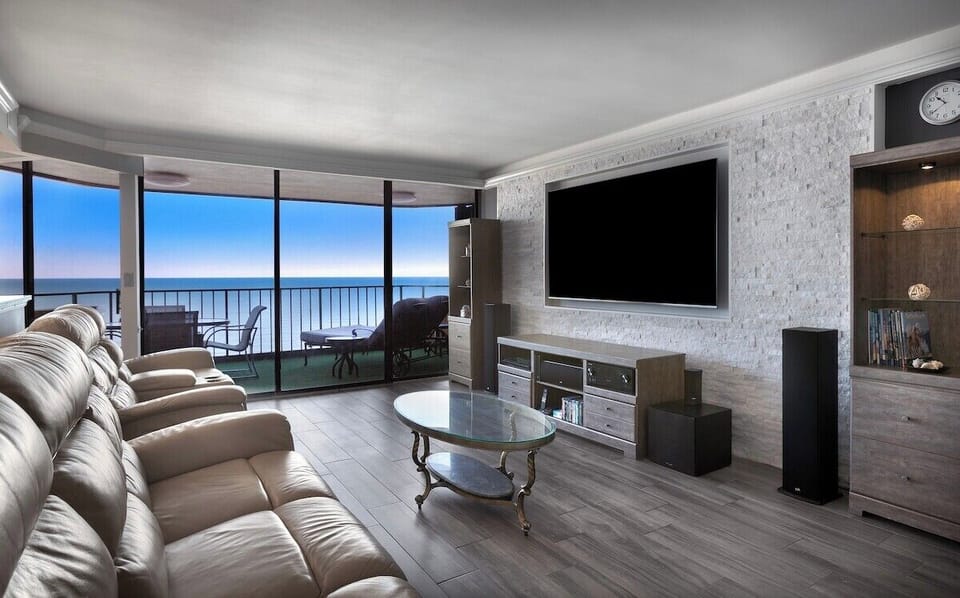 Breathtaking ocean views right out your window! This modern, open-concept living area is ideal for unwinding after a day on the beach.