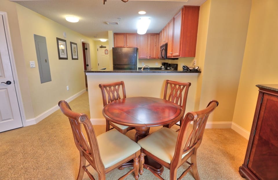 Dining Area - Dining table for meals together, whether breakfast before the beach or dinner with family.