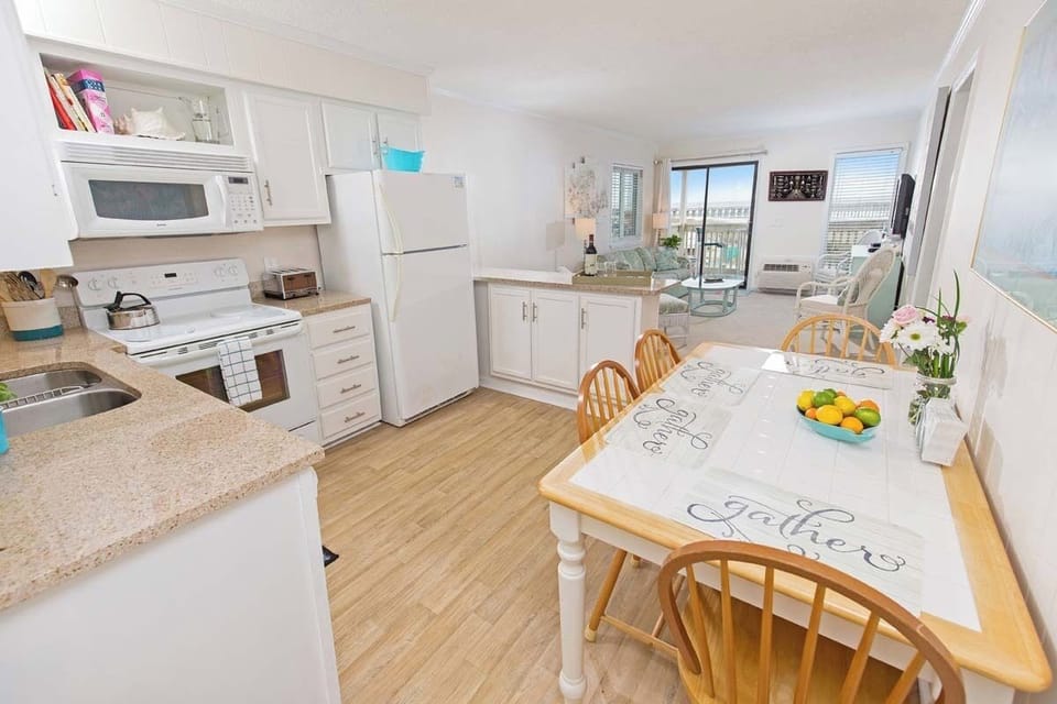 Enjoy meals together at the dining table, just steps from the kitchen and living room.