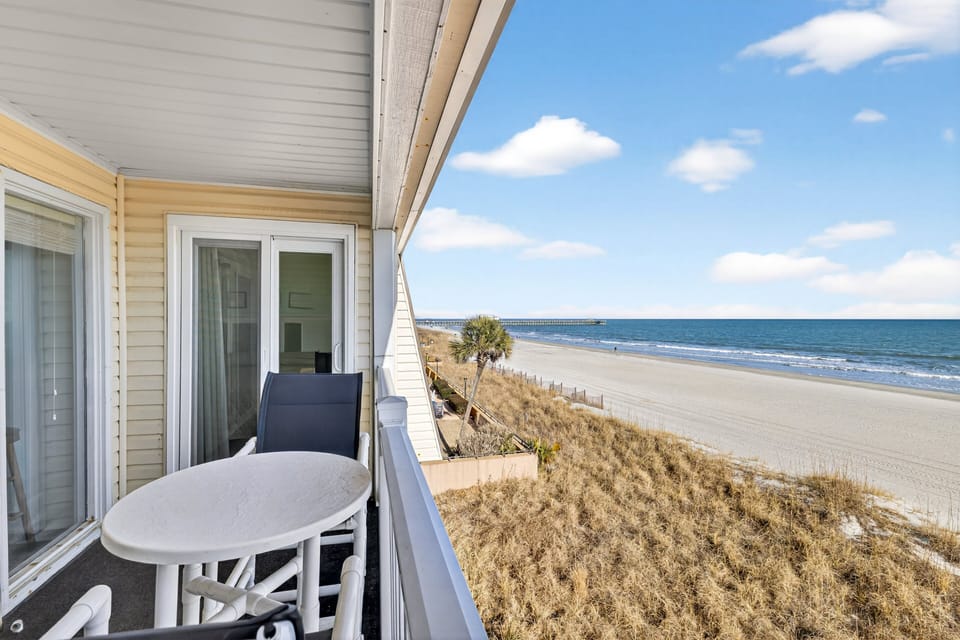 Oceanfront Balcony - Private balcony overlooking the Atlantic Ocean with views of the beach and shoreline.