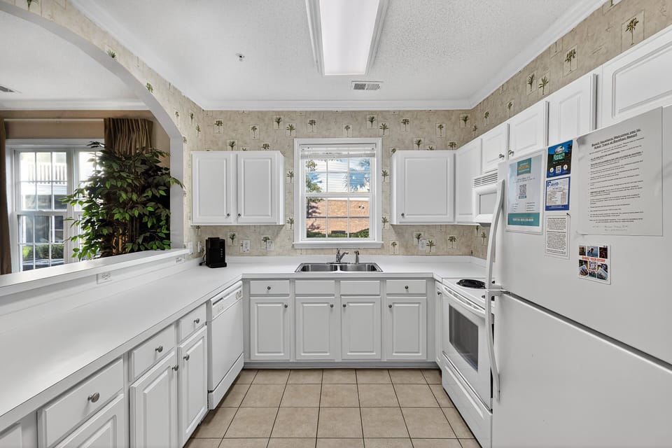 Kitchen - Spacious kitchen with full‑size appliances and ample counter space for preparing meals during your stay.
