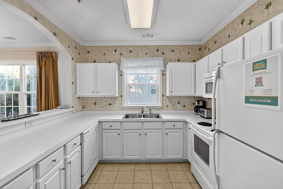 Kitchen - Cook easily in the full kitchen with major appliances, cookware, and all essentials for meal preparation during your stay.