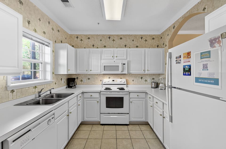 Kitchen - Full kitchen with modern appliances and all the essentials you need to prepare home‑style meals during your vacation.