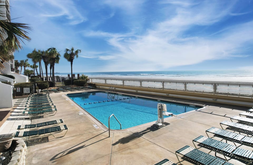 Oceanfront Outdoor Pool - Outdoor pool located on the oceanfront property with space for swimming and relaxing near the beach.