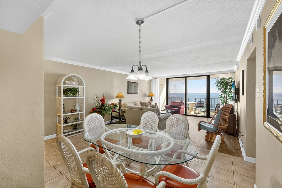 Dining Area - Dining table located beside the living area and kitchen, providing space for meals or gathering together.