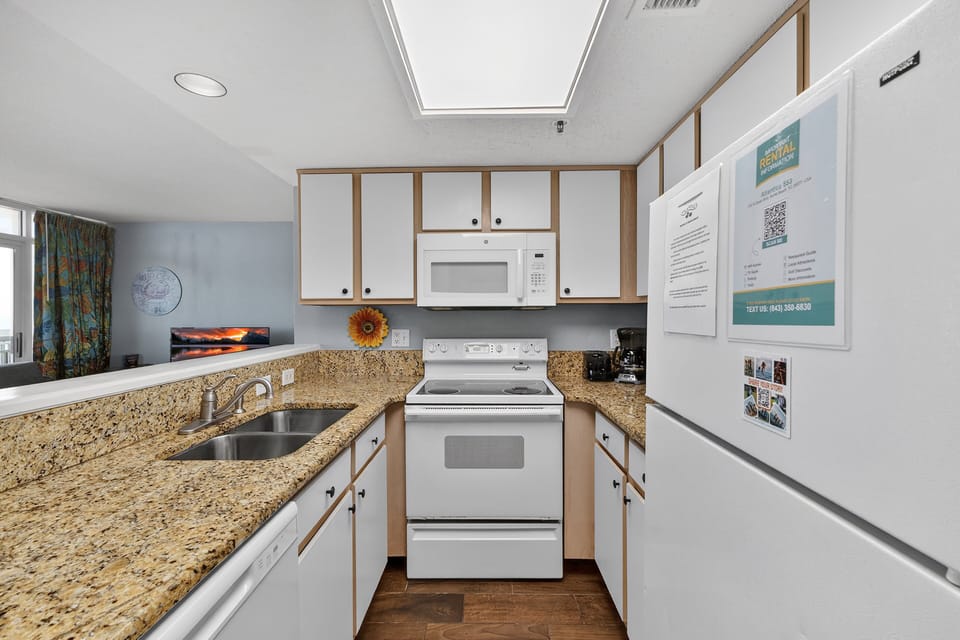 Kitchen - Prepare home-cooked meals with ease in the full kitchen — includes cookware, coffee maker, toaster, and more.
