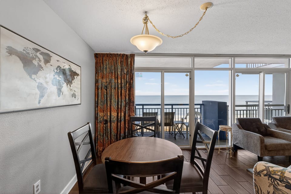 Dining Area - Enjoy meals together at the dining table just off the kitchen — perfect for family gatherings.