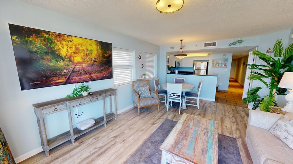 Living Room - Start your day with panoramic ocean views or relax with the sunset from your private balcony.