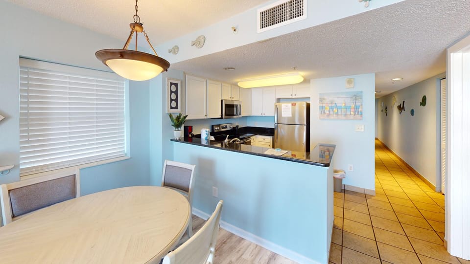 Dining Area - Enjoy breakfast or dinner together in the cozy dining space just off the kitchen.