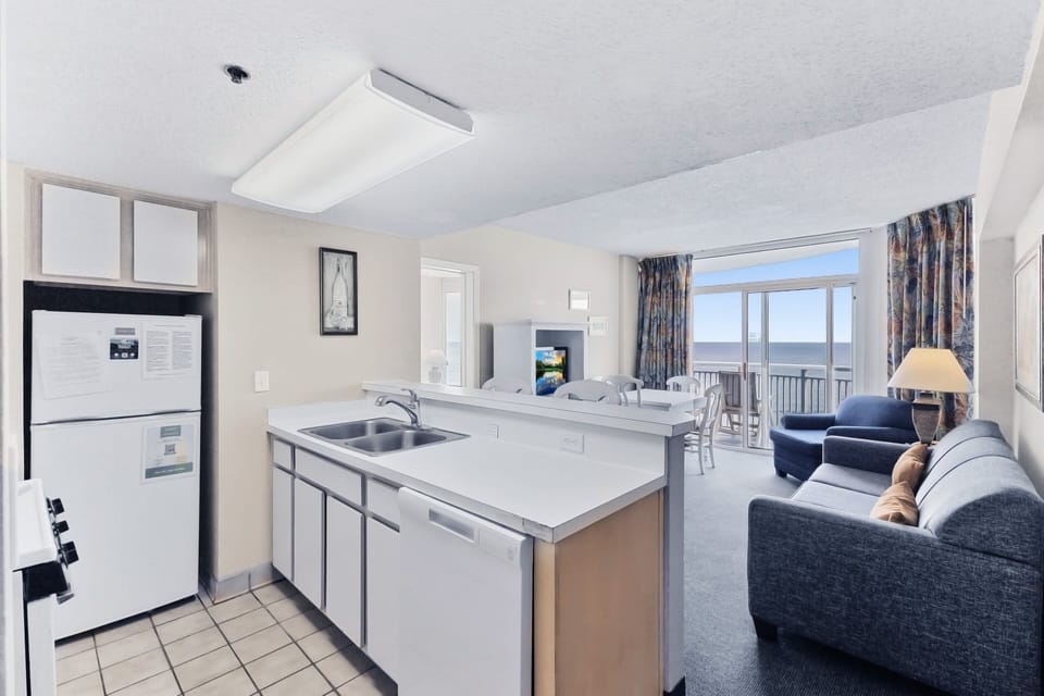 Kitchen - Full kitchen featuring essential appliances, cookware, and utensils so you can prepare meals and snacks with ease.