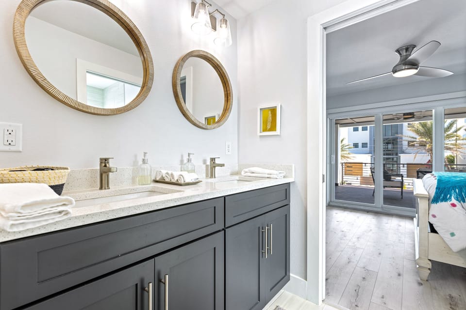 The 2nd Level Jack-and-Jill bath offers dual sinks and a walk-in shower.