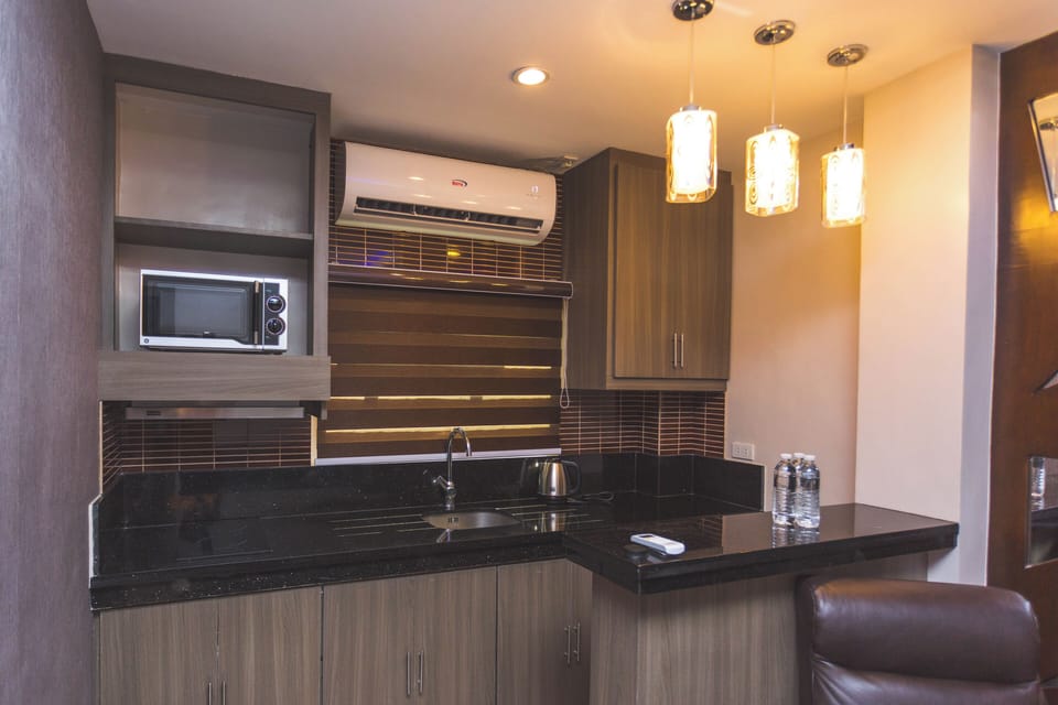 Luxury Suite, Balcony | Private kitchen | Mini-fridge