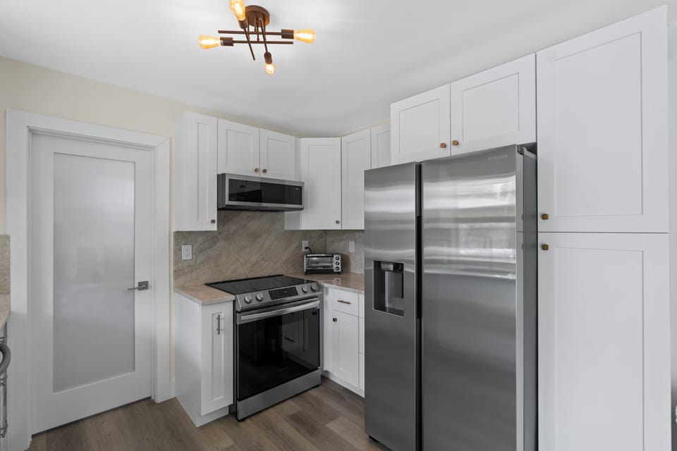 Upgraded open kitchen with all the appliances needed to make your gourmet meals.
