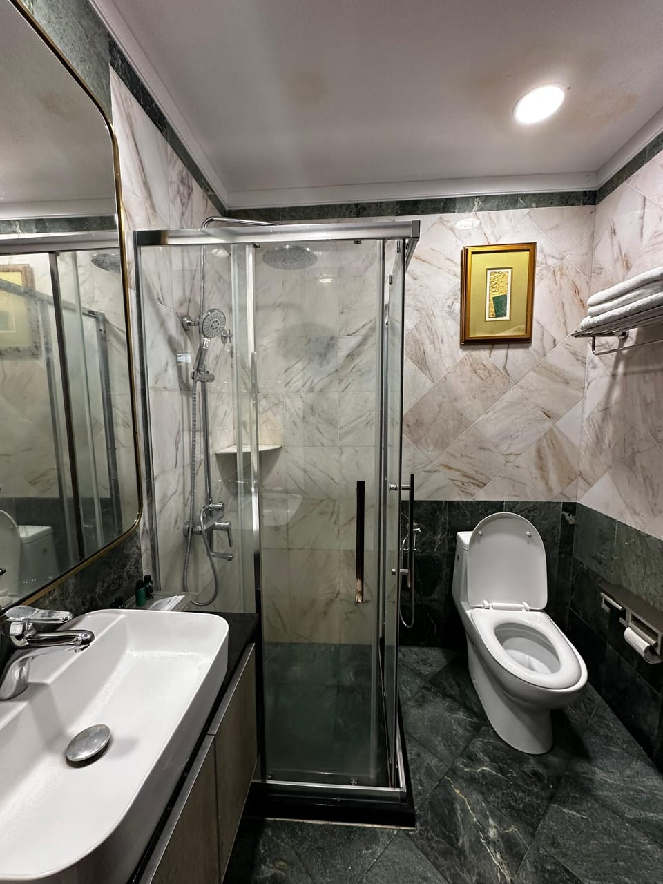 Premium Triple Room, Garden View | Bathroom | Shower, hair dryer, slippers, towels