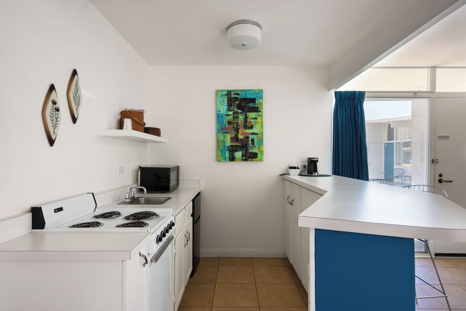 Colorful kitchenette.