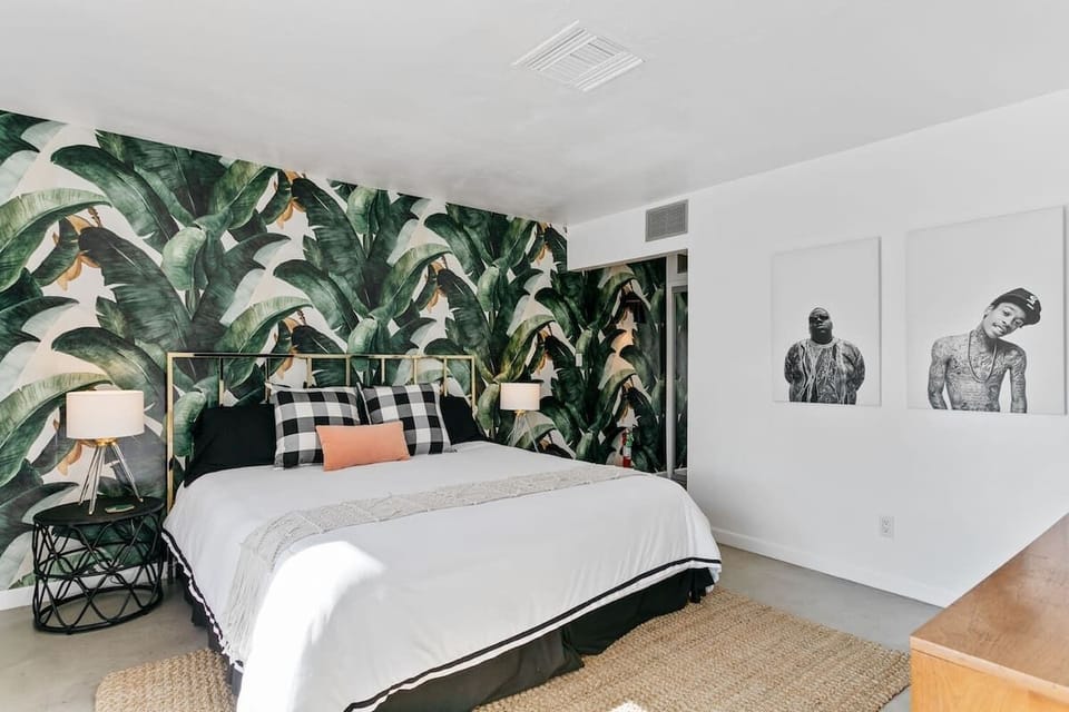 Room 1 features two bedrooms with a king bed each and a mini fridge.