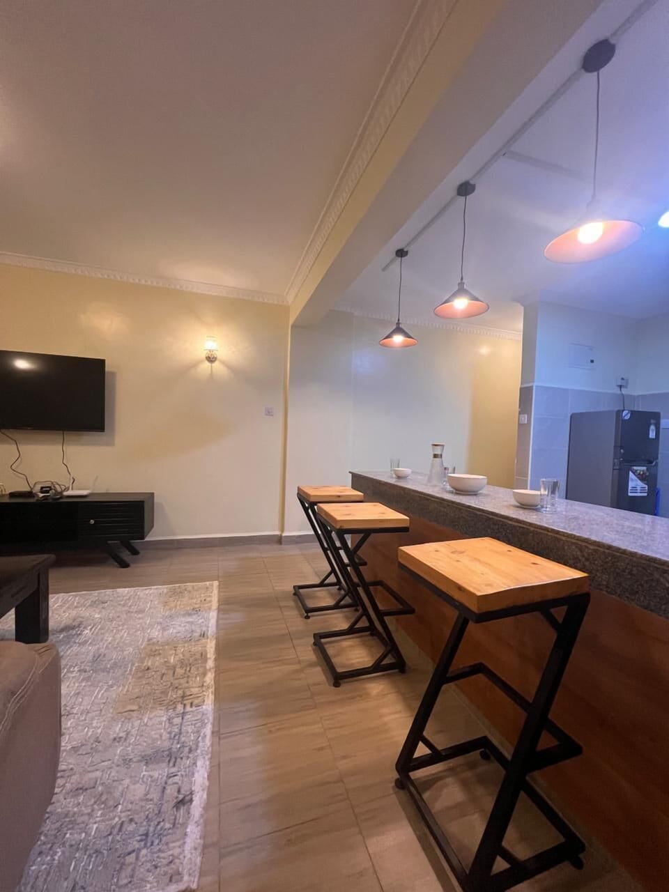 Family Apartment, Balcony, City View | Living area | 24-inch Smart TV with digital channels
