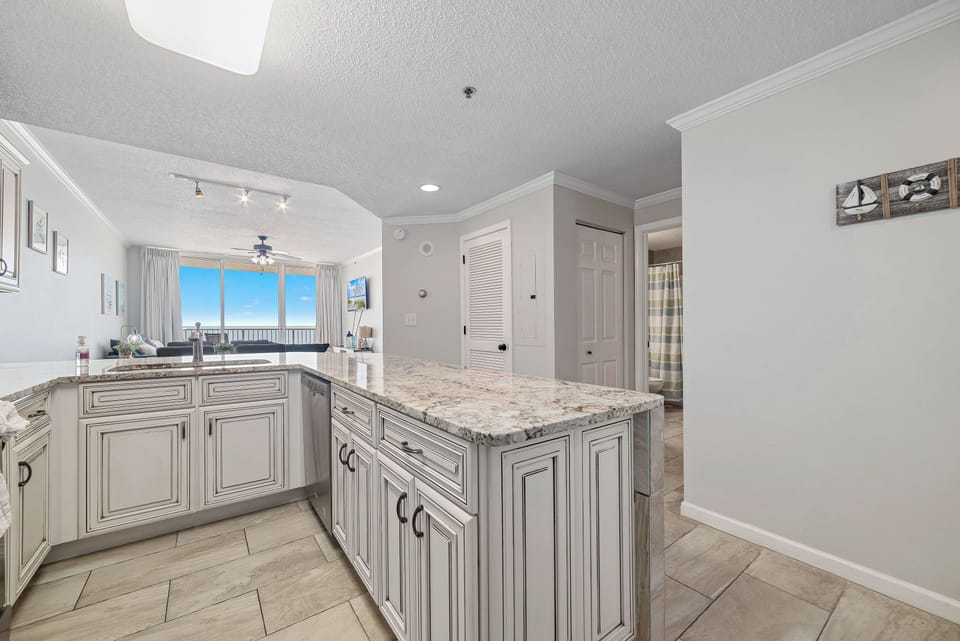 Bright and airy kitchen with ample counter space and modern amenities, creating an inviting space for cooking and gathering.