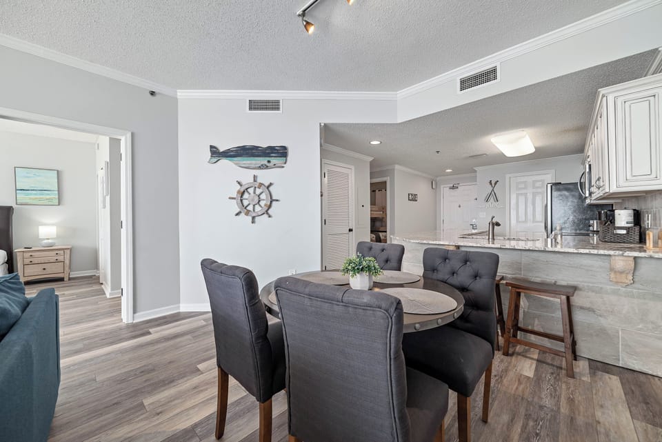 Gather and create memories in this beautifully appointed dining area.