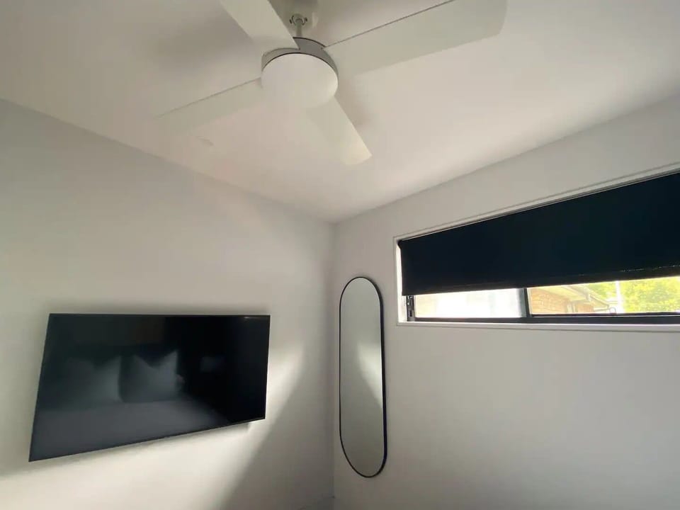Both bedrooms have 65inch TV, AC, ceiling fans, full length mirror & blinds