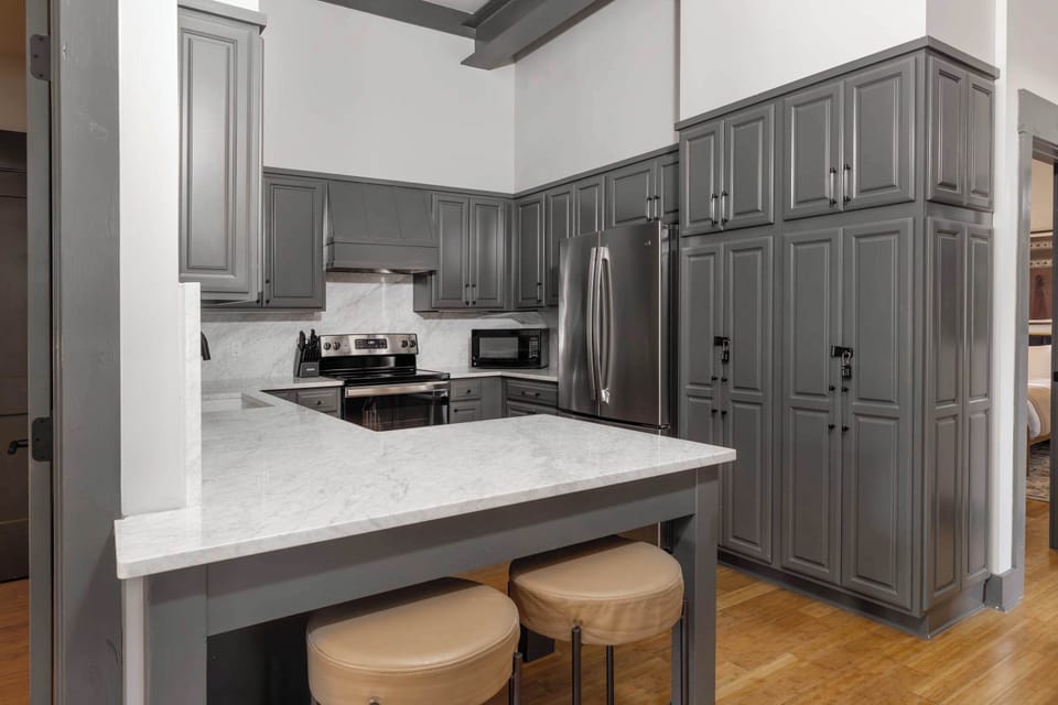 Kitchen | Fully Equipped with Essential Cookware | Open Layout