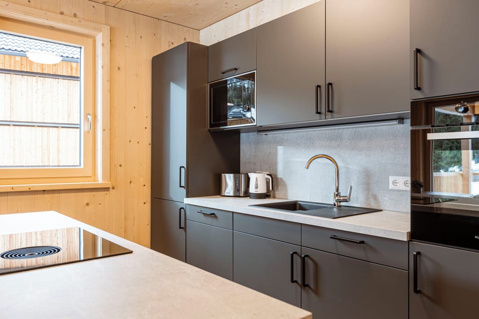Ferienwohnung mit 2 Schlafzimmern & Sauna | Private kitchen | Fridge, microwave, oven, stovetop