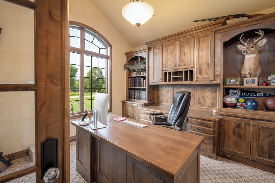 Office with computer and printer/scanner to keep up any work related tasks.