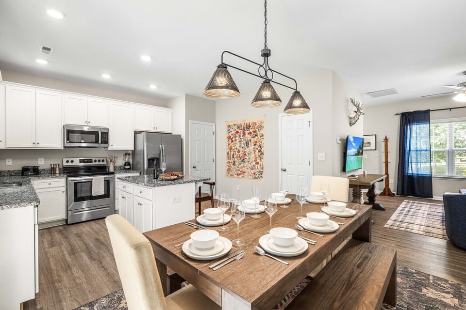 View of the living room and kitchen from the dining area