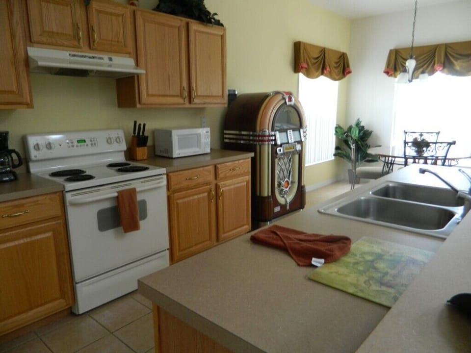 Villa, Multiple Beds, Pool Access, Garden View (5 Bed Florida Villa - West Haven) | Private kitchen | Fridge, microwave, oven, stovetop