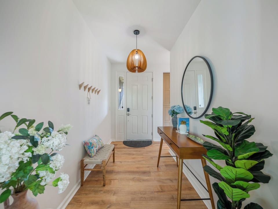 Welcoming entry with warm island touches!