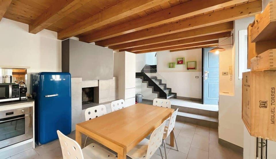 Bright dining room with access to the upper floor