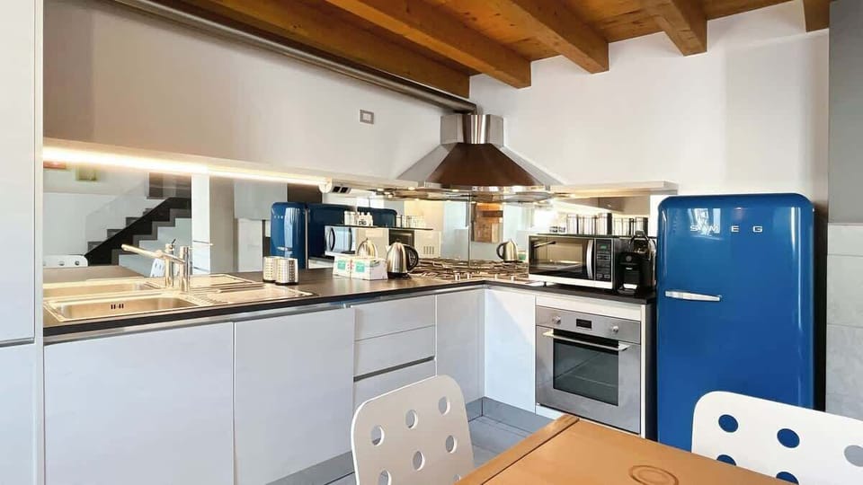 Bright and spacious kitchen tastefully furnished