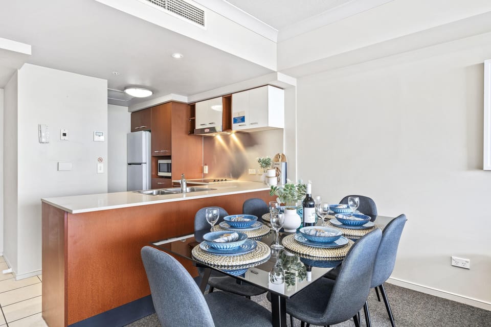 Dining area is right next to the fully equipped modern kitchen