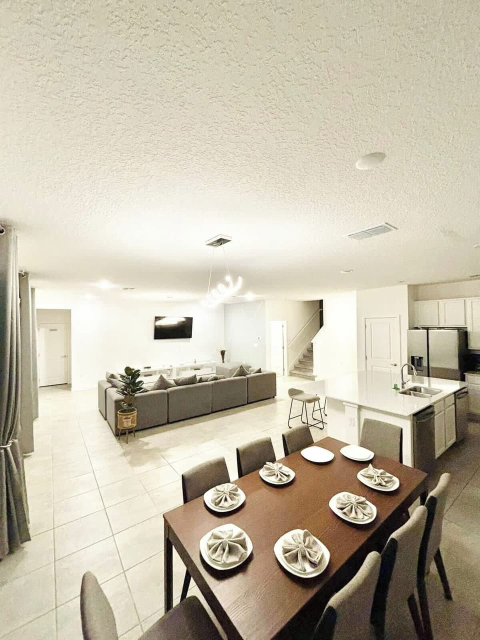 Bright open dining area with elegant table seating for 6